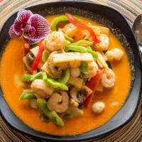 Pad Taray · Red curry and coconut milk, stir fried in a combination of shrimp, scallop, bambo shoots, gr...