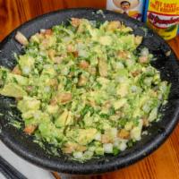 Guacamole Casero Dip · Fresh made! Chunks of avocado mixed with tomato, onion, cilantro, jalapeños, lime and salt.