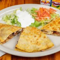 Quesadilla · Cheese and your choice of meat, stuffed in a flour tortilla and perfectly grilled. Get two f...