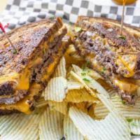 Beck'S Patty Melt · Double Patty, American Cheese,  Grilled Onion, Marble Rye. Served with Chips.