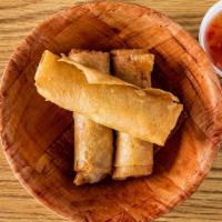 Lumpia · 4 Pcs. Ground pork meat with veggies wrapped and fried in an egg roll wrapper.