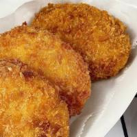 Crispy Potato Croquette · Fried breaded patties filled with potato, onion, green peas, corn, and carrots 

[contains w...