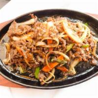 Bulgogi · Beef with carrot, onion, green onion, stir-fried in a soy sauce and sesame oil

[contains soy]