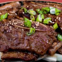 Galbi · Grilled korean beef bbq short ribs served with rice
