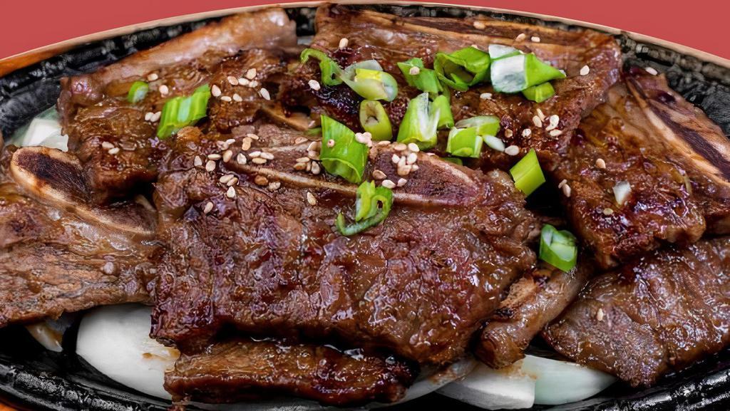Galbi · Grilled korean beef bbq short ribs served with rice