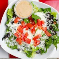 Greek Salad · Romaine, onions, sliced black olives, freshly grated feta cheese, roma tomatoes, special Gre...