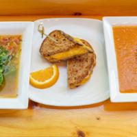 Roasted Tomato Basil Soup · Tomatoes, celery, carrots, onions, seasonings, and olive oil. Topped with housemade gluten-f...