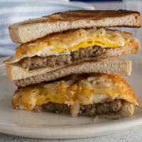 Mek · Sausage, egg, cheese and the perfect topper hash browns.
(Served on white toast unless other...