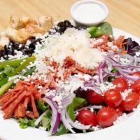Vito & Nicks Salad · Mixed greens with tomatoes, black olives, green peppers, onions, pepperoni, cheese, and crou...