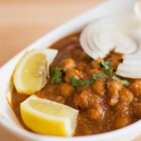 Chana Masala · Chickpeas, blend of onions, tomatoes and aromatic spices.