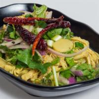 Bamboo Shoot Salad · Shredded bamboo, ground roasted rice, red onion, green onion, mint, cilantro mixed in spicy ...