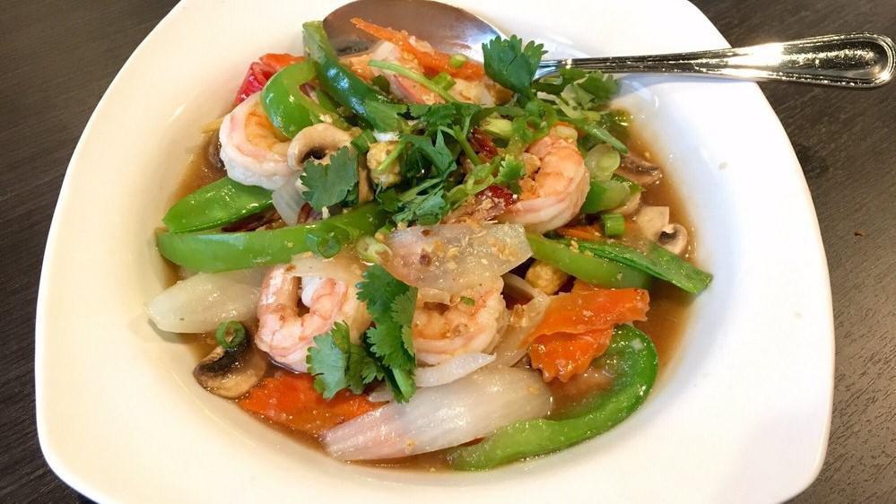 Garlic Shrimp · Jumbo shrimp stir-fried richly flavored with garlic, baby corns, onions, peppers, carrots, snow peas, mushrooms, topped with cilantro.