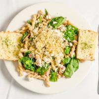 Vegetarian Greek Pasta · Gemelli pasta with fresh spinach, Kalamata olives, grilled portabella mushrooms, eggplant, z...
