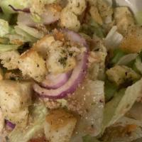 Greek Salad · A heaping salad of romaine lettuce, fresh spinach, Kalamata olives, grilled portabella mushr...