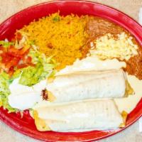 Chimichanga (1 Piece) · Choice of chicken or beef with lettuce, tomatoes, sour cream, guacamole and choice of rice o...