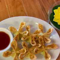 Cream Cheese Rangoon  · 6 (pc)of cream cheese Rangoon served  with our special sauce.