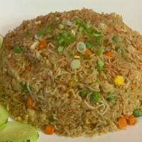 Chicken Fried Rice  · Fried rice with eggs, carrot, pea, green onion, and chicken.