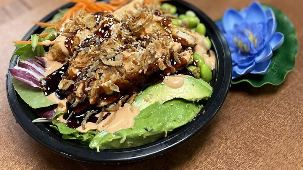 Vegetable Poke Bowl · Sushi  rice, tofu, mixed green, carrot, avocado, and edamame, topped with spicy mayo and sushi sauce, and sprinkled with crispy onion and sesame seeds.