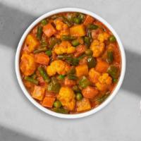 Vegetables Of Delight Curry · Potatoes, cauliflower, broccoli, carrot, cut beans, oil, whole garam masala, red - yellow on...