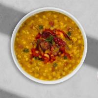 Dalai Lama Curry · Chana dal, yak yeti curry masala, ginger garlic paste, onion gravy, tomato gravy salt, and o...