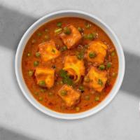 Doesn'T Matar Paneer Masala · Green peas, chopped and fried Indian cheese, heavy whipping cream, onion gravy, tomato gravy...