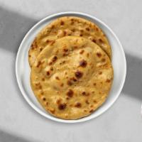 Tandoori Roti · Whole wheat flour, salt, and water.