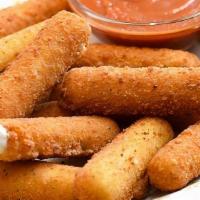 Mozzarella Sticks · Served with side of house dressing.