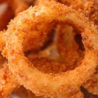 Onion Rings · Served with side of house dressing.