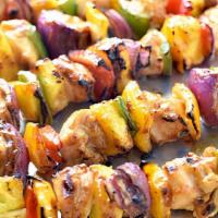 Chicken Kabob   · MARINATED CHICKEN TENDERLOIN, GRILLED ONIONS & GREEN PEPPERS ON TOP A BED OF OUR UNIQUE HOUS...