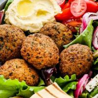 Falafel Bowl · A BED OF OUR UNIQUE HOUSE RICE, CRISPY 
FALAFEL PATTIES, FETA CHEESE, ONIONS, 
TOMATOES, CUC...