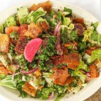 Fattoosh Salad · Popular, vegetarian. A large fresh salad mixed with toasted pita bread.
