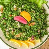 Tabbouli Salad · Vegetarian. Parsley, tomato, scallions, cracked wheat, olive oil, and fresh lemon.
