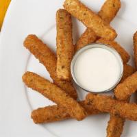 Breaded Zucchinis · Breaded and fried zucchinis. Comes with your choice of sauce. Side includes 10 pieces and a ...