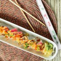 Hafer Park Roll · Inside: tempura shrimp, spicy crab salad.  Outside: tuna, salmon, eel, tempura crunch, green...