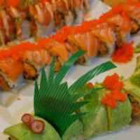 Crazy Cajun Roll · Inside: spicy crawfish, tempura crunch.  Outside: salmon, tempura crunch, green onion, masag...