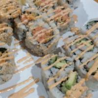 California Roll · Cooked. Inside: crab, avocado, cucumber.
