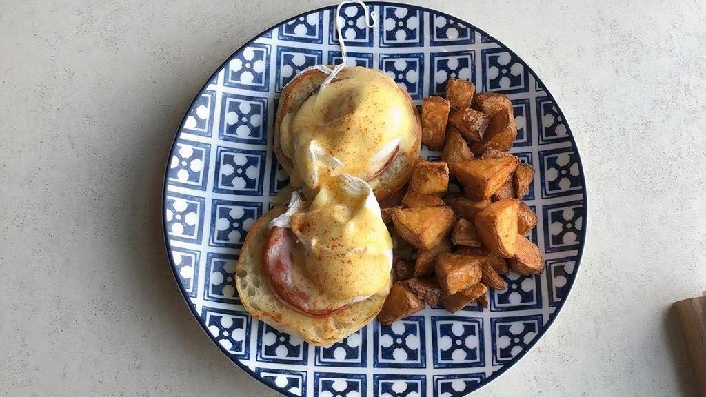 Classic Eggs Benedict · english muffin / canadian bacon / hollandaise