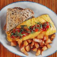 Tomato Mushroom & Chevre Omelette · crushed tomato sauce / braised spinach / wild mushrooms / basil / fresh goat cheese / multig...