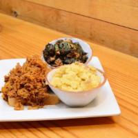 Pulled Pork  Dinner · Smoked and slow roasted, hand pulled and tossed with sweet n' tangy bbq. Served with your ch...