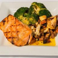 Grilled Salmon · Fresh grilled salmon served with your choice of two house sides, prepared grilled (gf), blac...