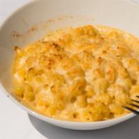F N' P House Mac N' Cheese · Cavatappi noodles tossed with our house mac cheese biend oven finished with toasted parmesan...