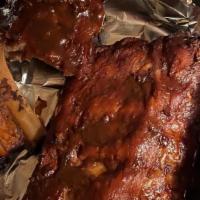Baby Back Ribs · The best! Slow cooked Grandpa's way in our special marinade and broiled to perfection. Toppe...