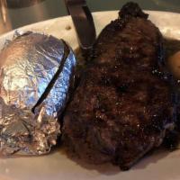 New York Strip Steak · A juicy 14 oz strip steak with mushroom caps and bordelaise sauce. For steak lovers!