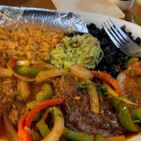 Carne Asada · Grilled skirt steak, Mexican white rice, beans, fajita vegetables, guacamole, grilled jalape...