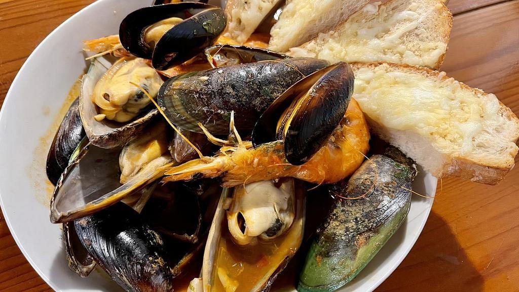 Diabla Shrimp & Mussels · Sauté mussels and shrimp, garlic, white wine, cilantro, diabla sauce, and side of garlic bread.