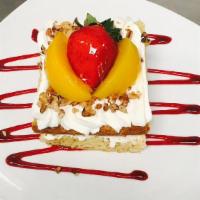 Tres Leches Cake · Sponge cake dipped into our signature three leches, topped with whipped cream, strawberries,...