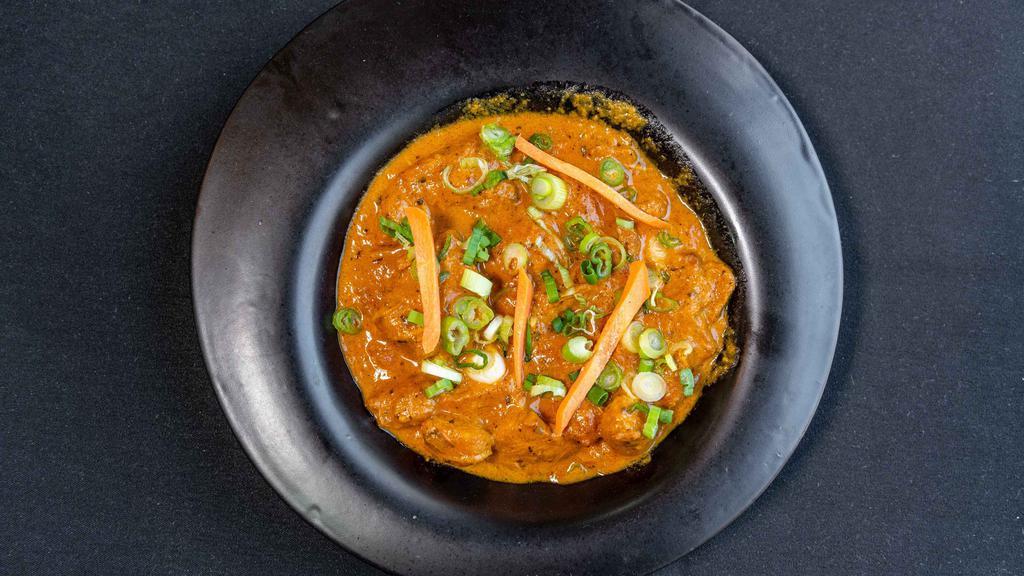 Chicken Korma · Gluten-free. Cooked in a creamy sauce with almonds, dried nuts and lightly spiced.