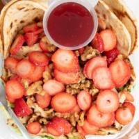 Strawberry Chicken Salad · Mixed greens, strawberries, walnuts, and mandarin oranges