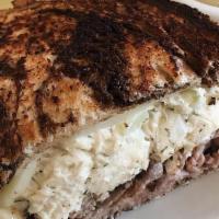 Mother Mohawk · Grilled roast beef and homemade chicken salad, topped with swiss cheese on marble rye bread....