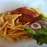 Spicy Buffalo Chicken · Breaded chicken breast tossed in buffalo sauce and topped with lettuce, tomato and onion ser...